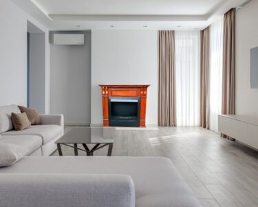 Classic Oak Gas Fireplace. A timeless wooden texture fireplace design crafted with oak look, perfect for traditional settings. For Order Call: 03024040006