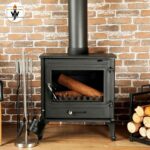 B-Fire Cast Iron Wood Burning Fireplace with traditional design and roaring flames.