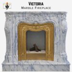 Victoria Marble Fireplace in Pakistan Victoria Olympic Striato stone white base with black stripes and brass gas burning interior.